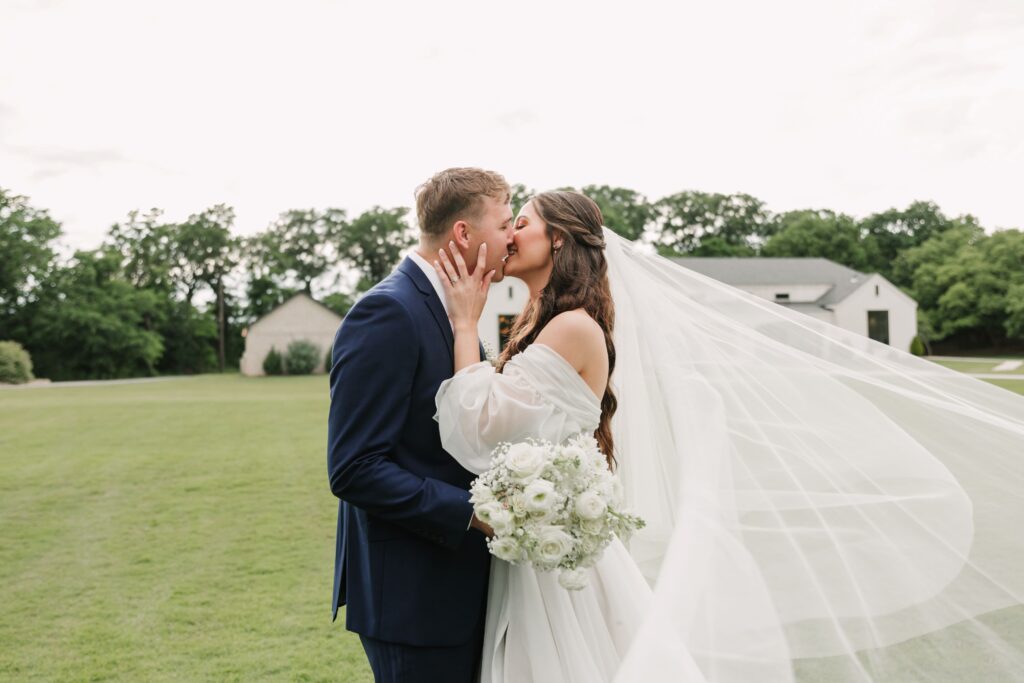 first look photo bride and groom about to kiss