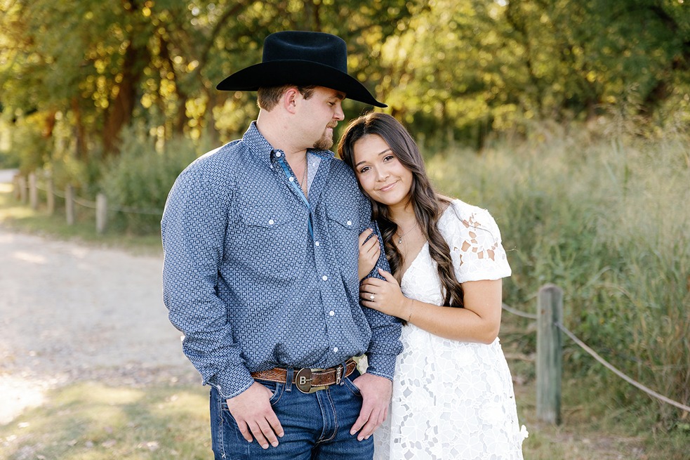 OKC wedding photographers capture couple at sunset during engagement session