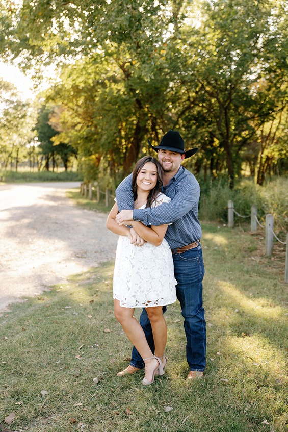 OKC wedding photographers capture couple at sunset during engagement session